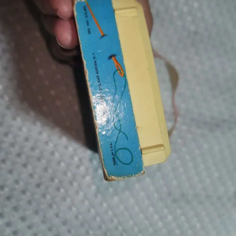 VINTAGE FISHER POP GOES THE WEASLE MUSIC POCKET RADIO TOY